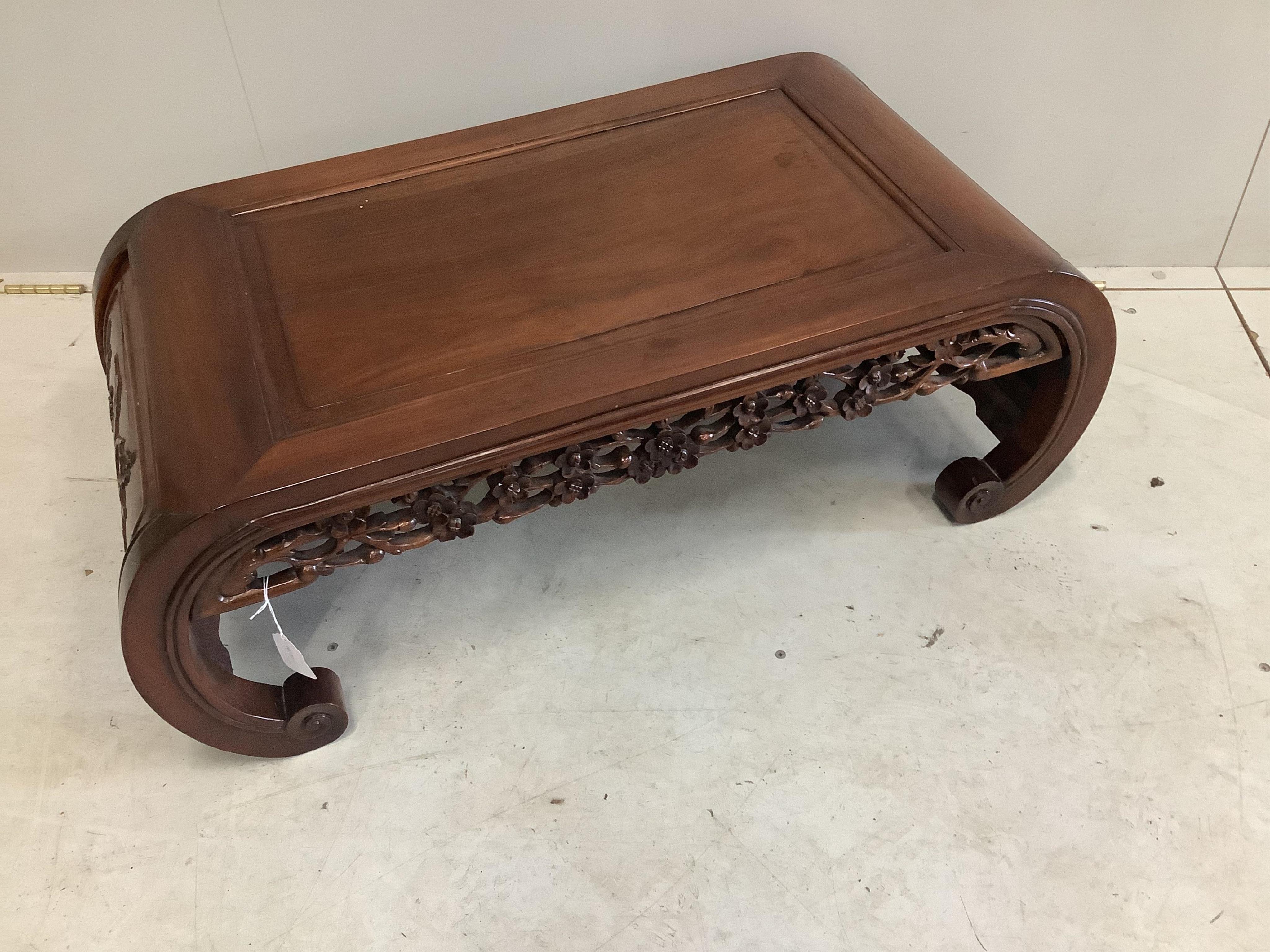 An early 20th century Chinese hardwood opium table, width 88cm, depth 46cm, height 33cm. Condition good.